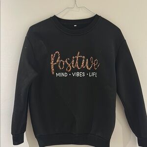 Black Crewneck Sweater with Metallic Text